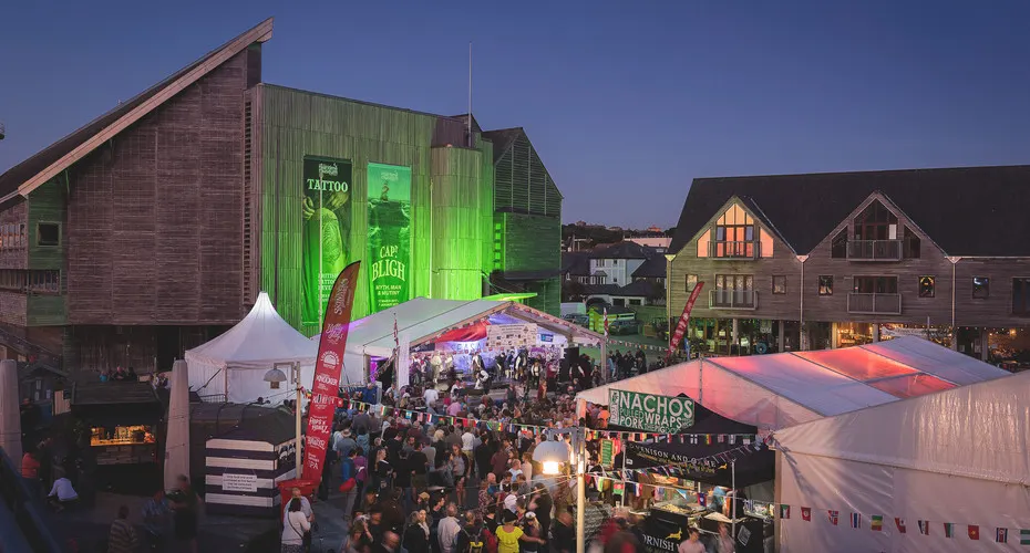 A festival with market stalls at Falmouth harbour