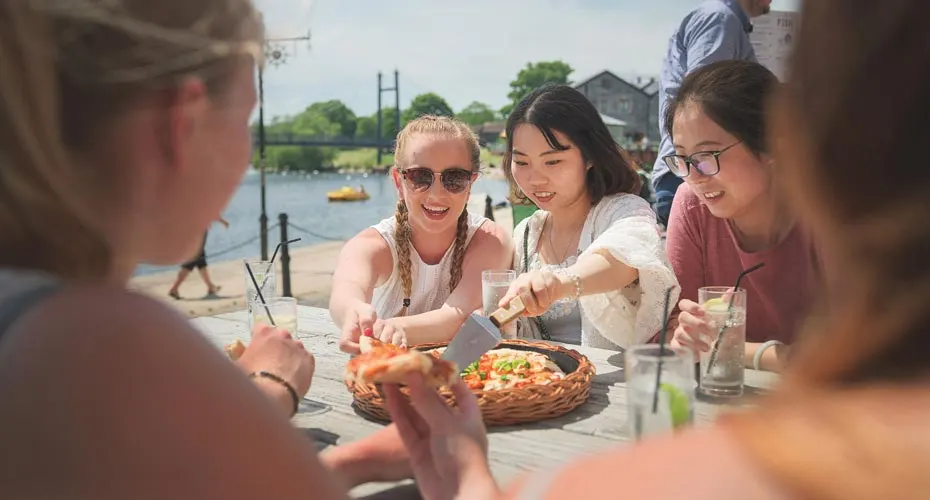 Eating pizza on the Quay